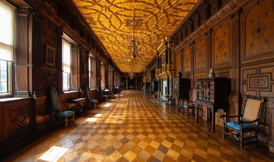 The Long Gallery at Hatfield House, oak panelled with a gilded ceiling